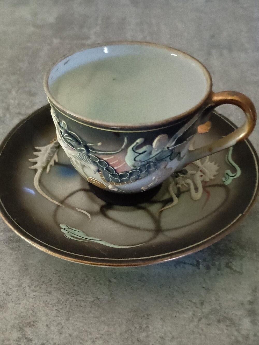 Hand-Painted Dragon Teacup and Saucer - Black and Gold